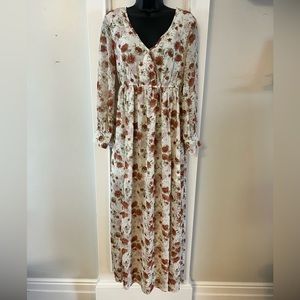 Flowy floral dress in creams, browns, and lavender